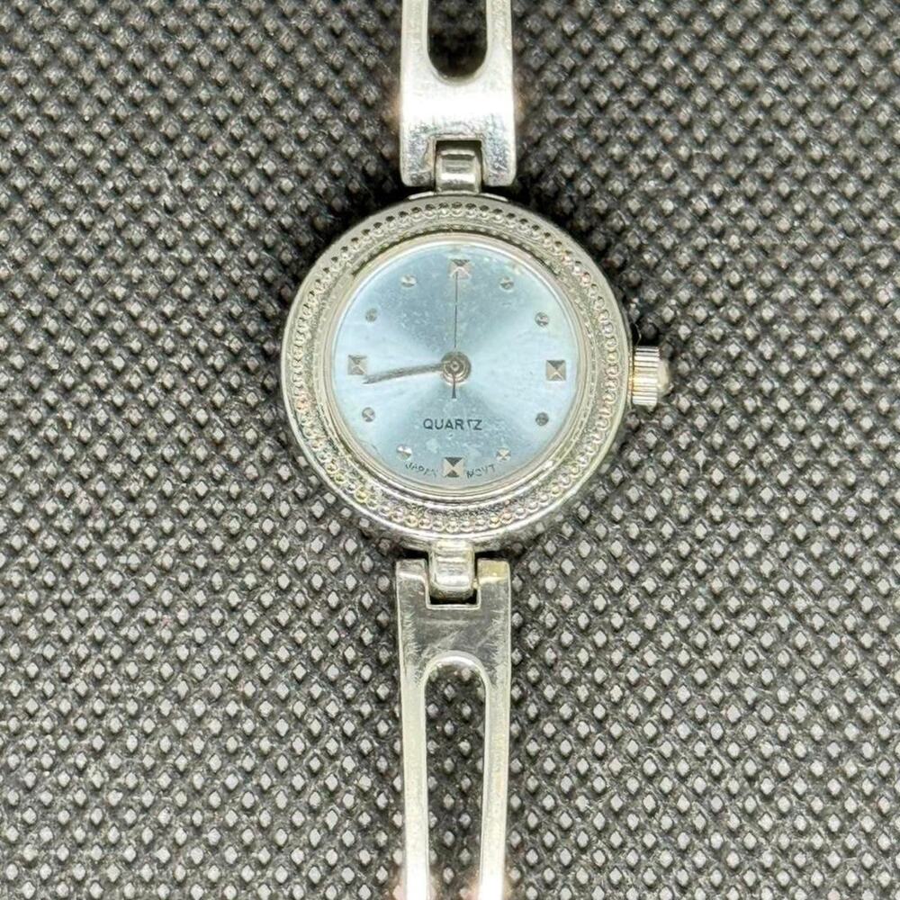 Silver tone watch with blue